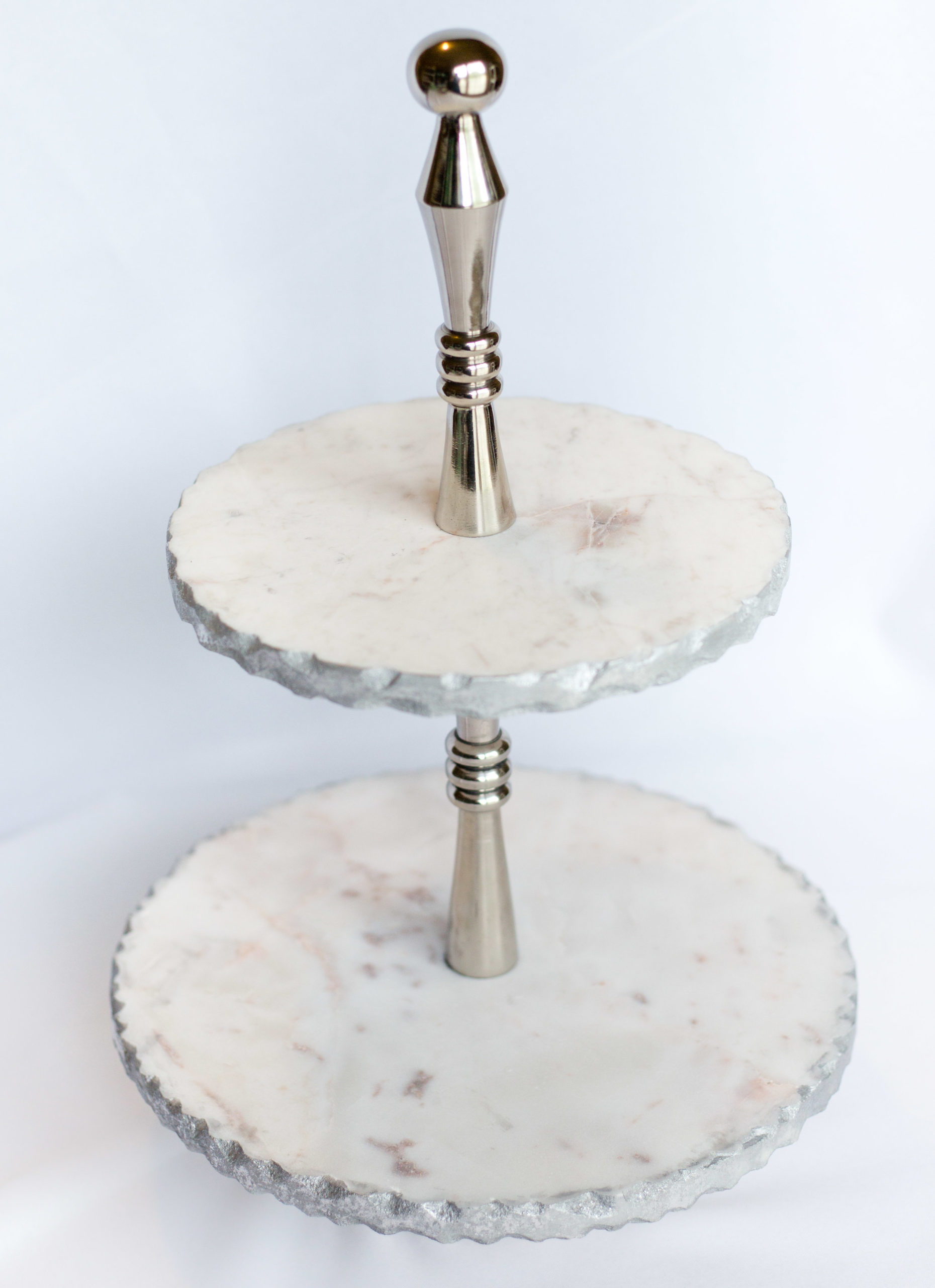 Marble with silver trim dessert stand.jpg